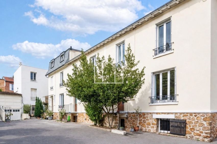 Image Façade à  maison mitoyenne de Suresnes