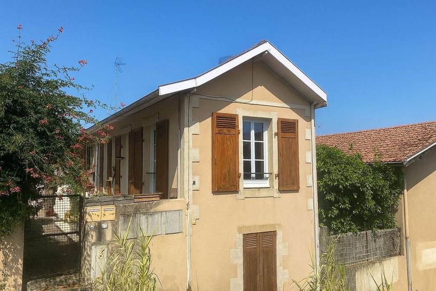 Image Façade à  maison mitoyenne de Arcachon