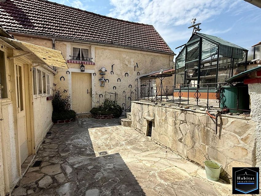 Image Façade à  maison mitoyenne de Baron