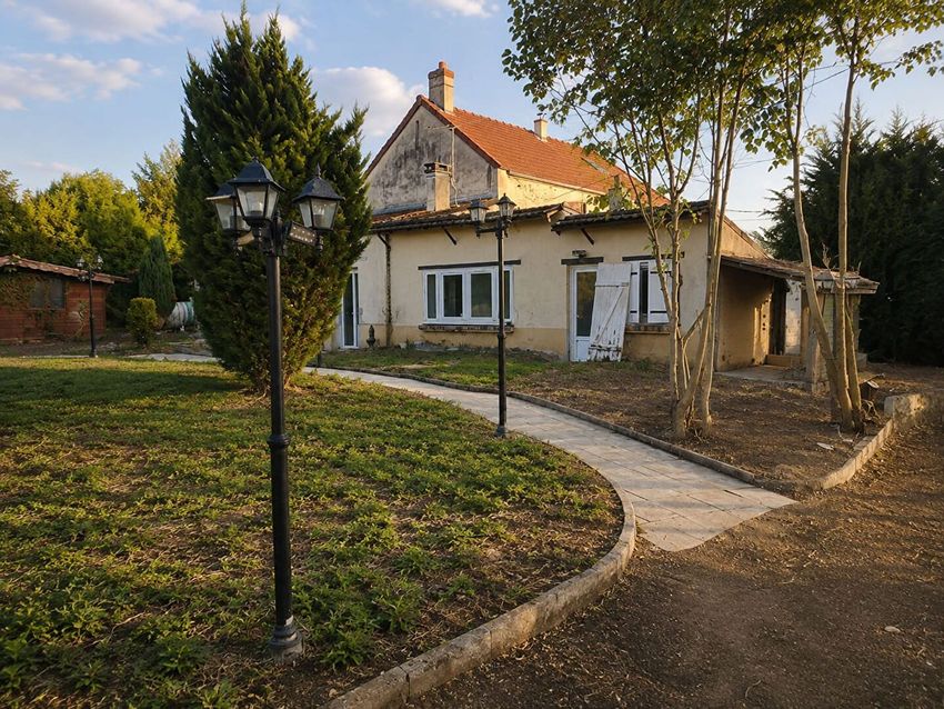 Image Façade à  maison individuelle de Doue