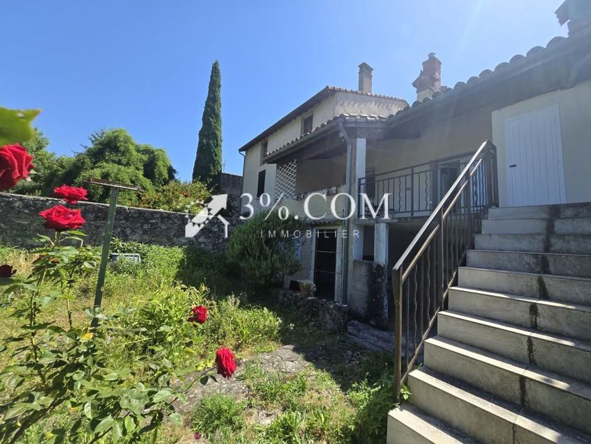 Image Façade à  maison de village de Combovin