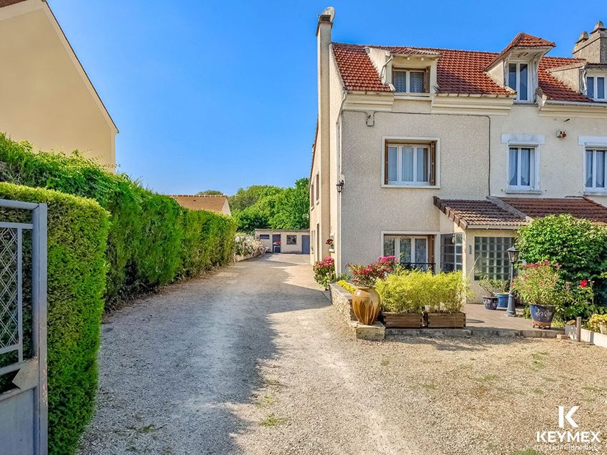 Image Façade à  maison individuelle de Baillet-en-France