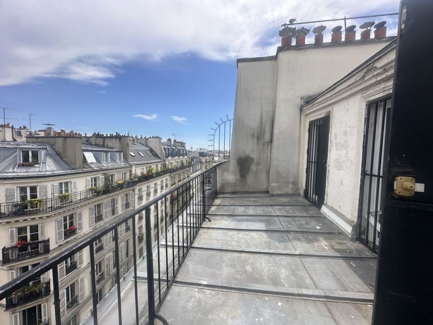 Image Terrasse à appartement de 25 Rue des Martyrs