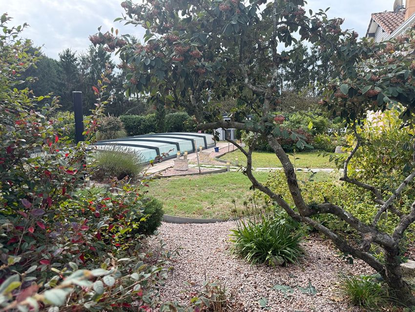 Image Jardin à  maison individuelle de Saint-Vincent-de-Paul