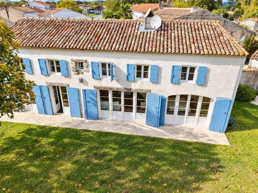 Image Façade à  maison individuelle de Arces