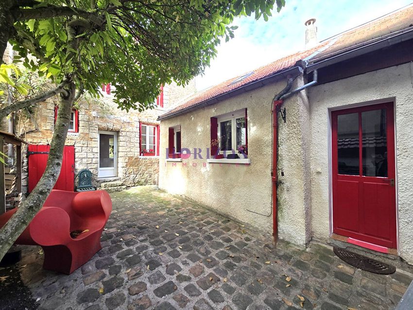 Image Façade à  maison mitoyenne de Lassy