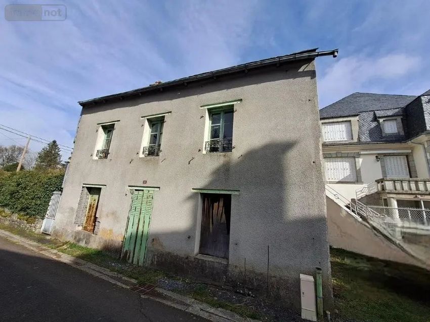 Image Façade à  maison individuelle de Marcenat