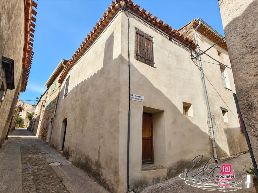Image Façade à  maison mitoyenne de Caunes-Minervois