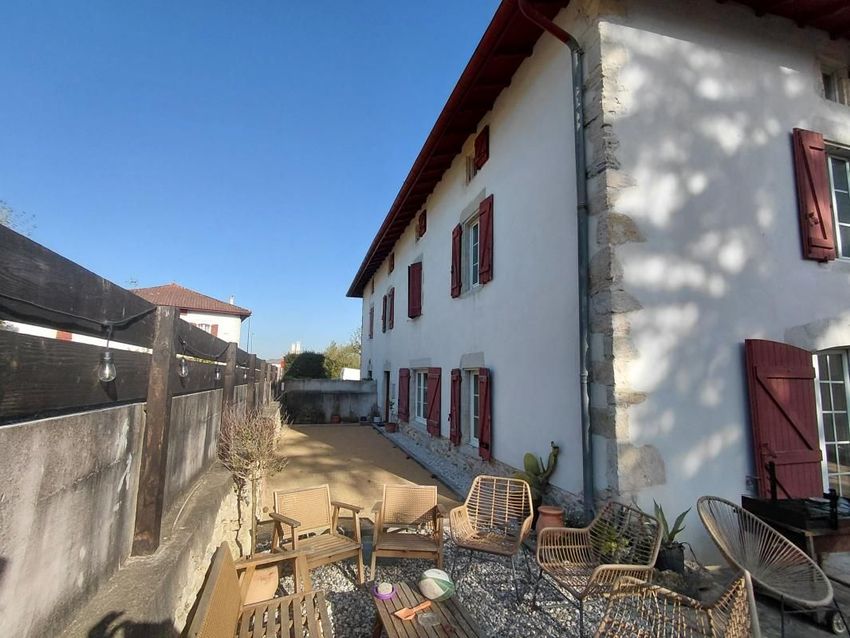 Image Façade à  maison individuelle de Guiche