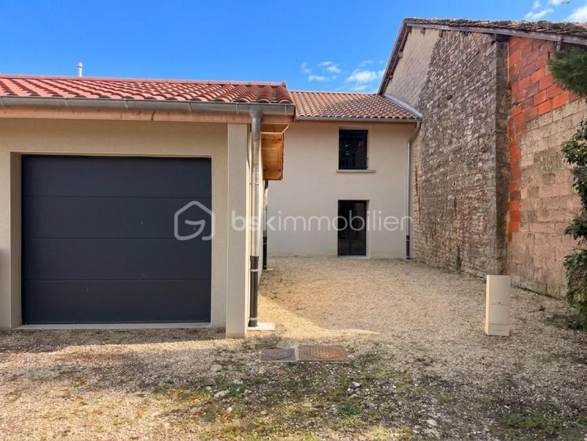 Image Façade à  maison individuelle de Tossiat