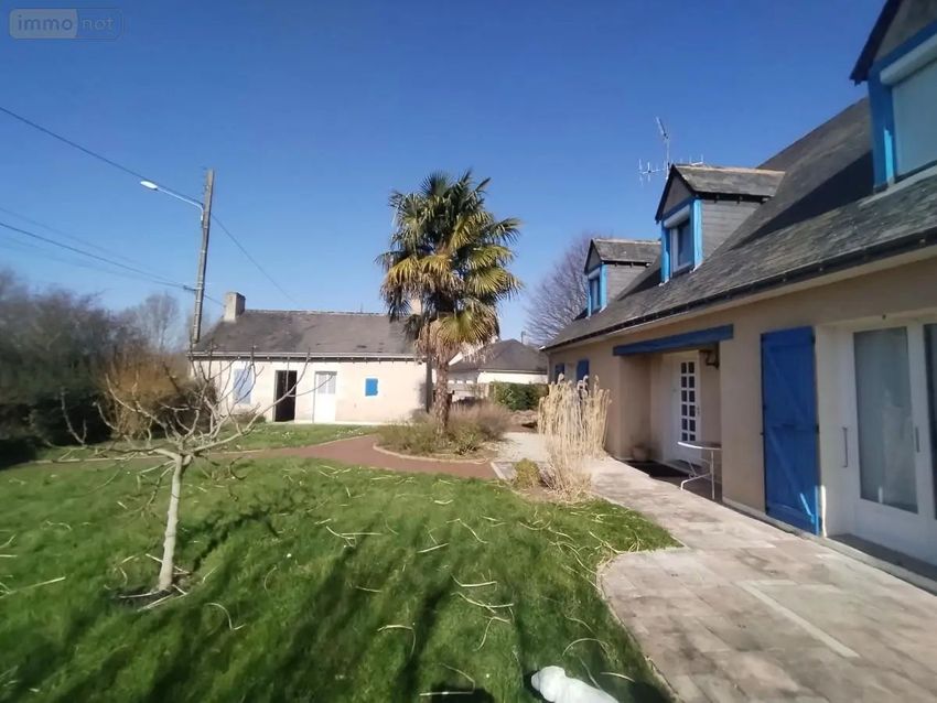 Image Façade à  maison individuelle de Feneu