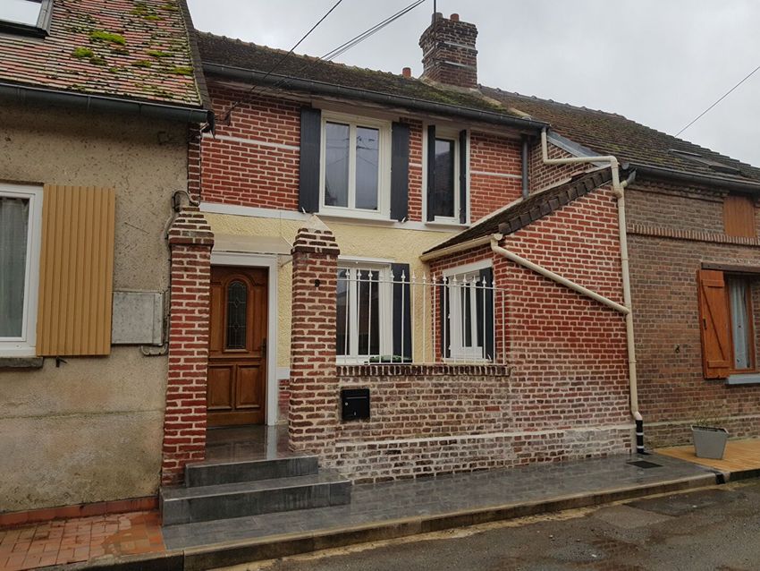 Image Façade à  maison mitoyenne de Bulles