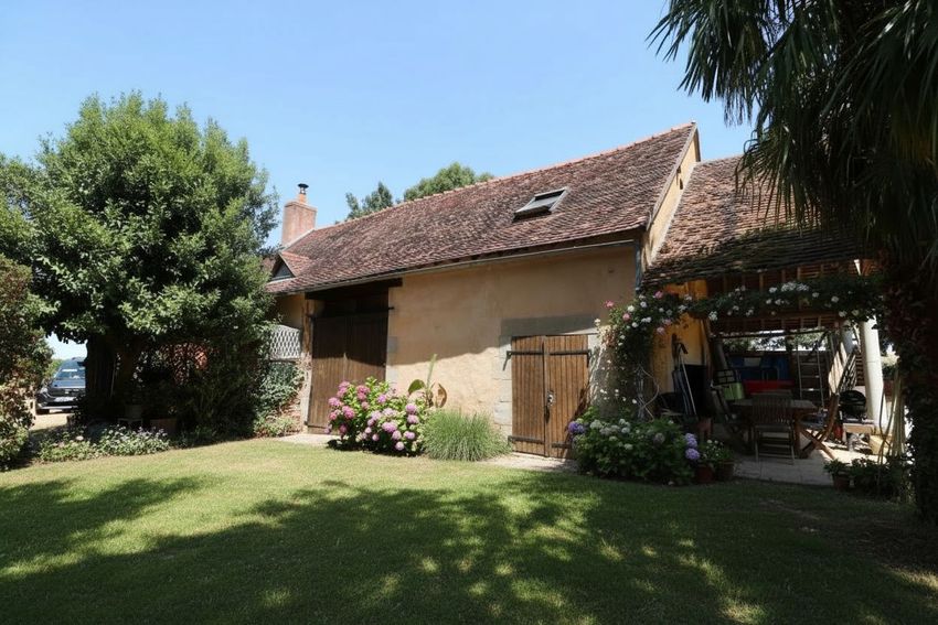 Image Façade à  maison individuelle de Dornes