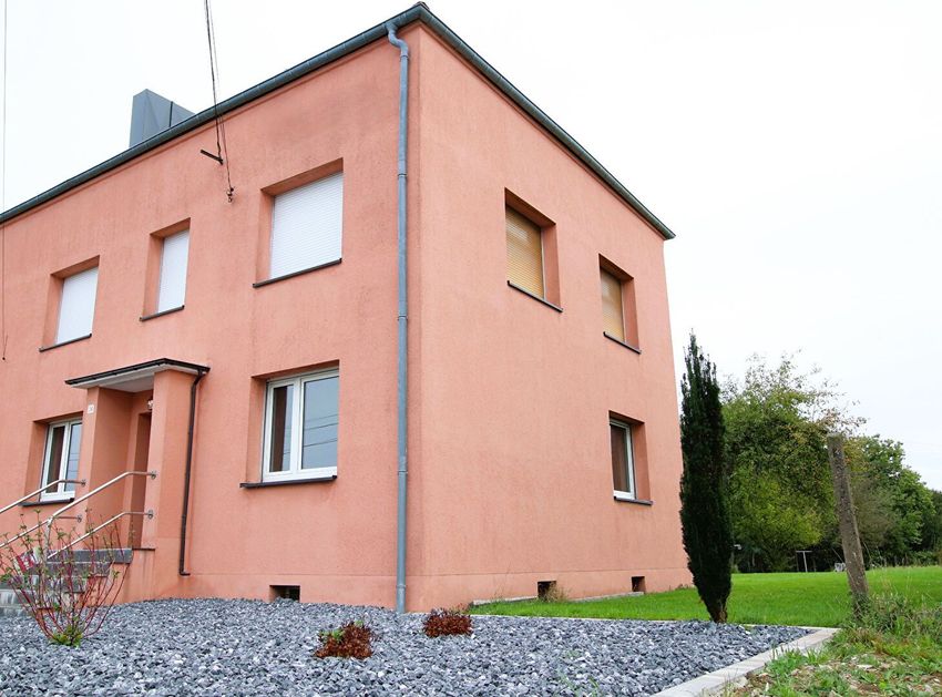 Image Façade à  maison mitoyenne de Biding