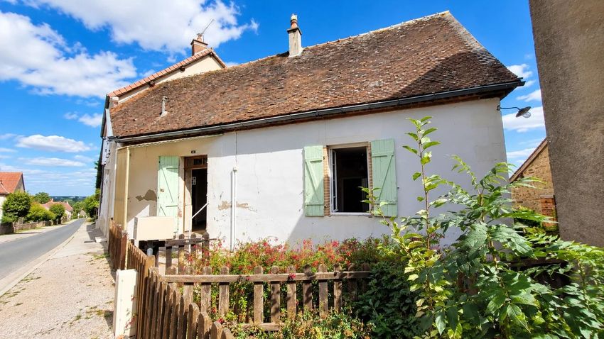 Image Façade à  maison de village de Le Theil