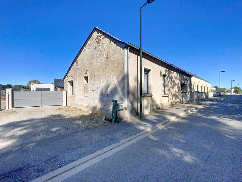 Image Façade à  maison individuelle de Feneu