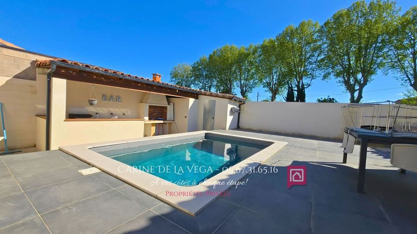 Image Piscine à  maison mitoyenne de Tourbes