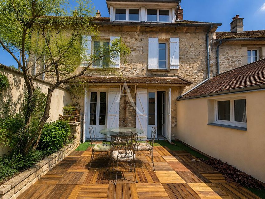 Image Façade à  maison mitoyenne de Commeny