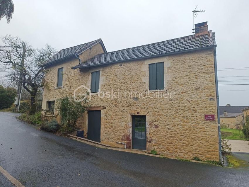 Image Façade à  maison de village de Doissat