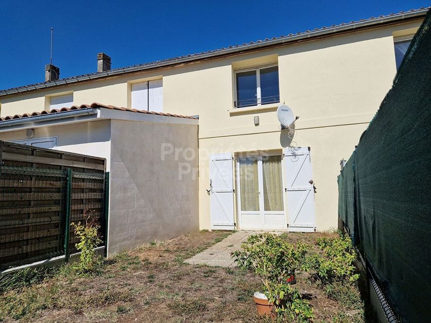 Image Façade à  maison mitoyenne de Cavignac