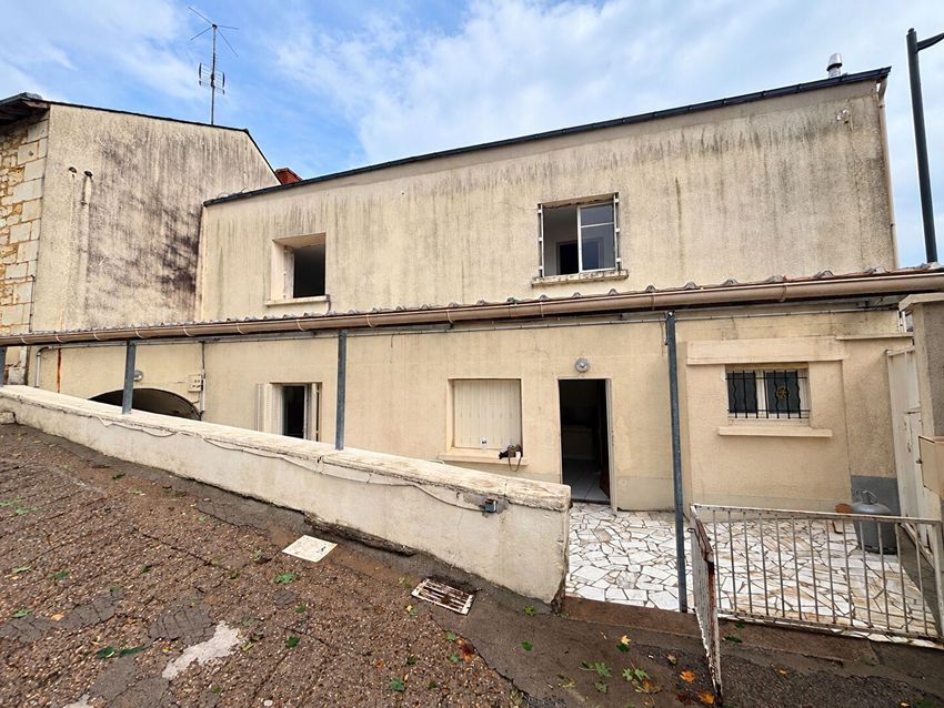 Image Façade à  maison mitoyenne de Distré