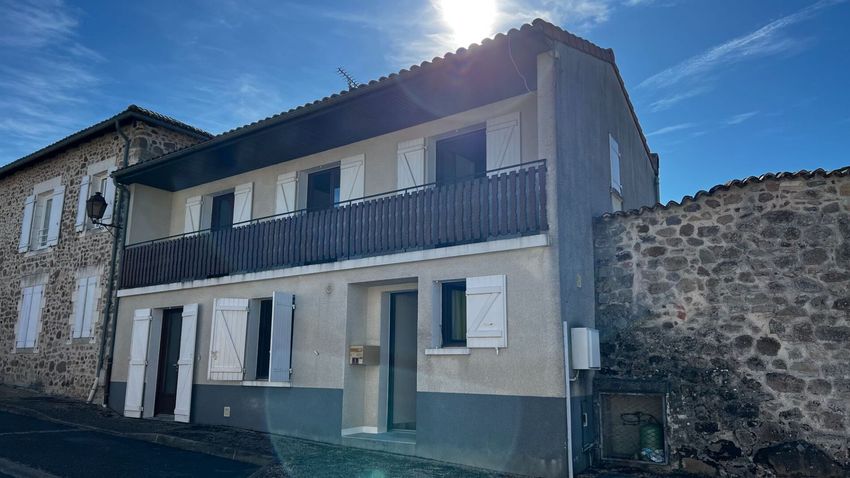 Image Façade à  maison mitoyenne de Étagnac