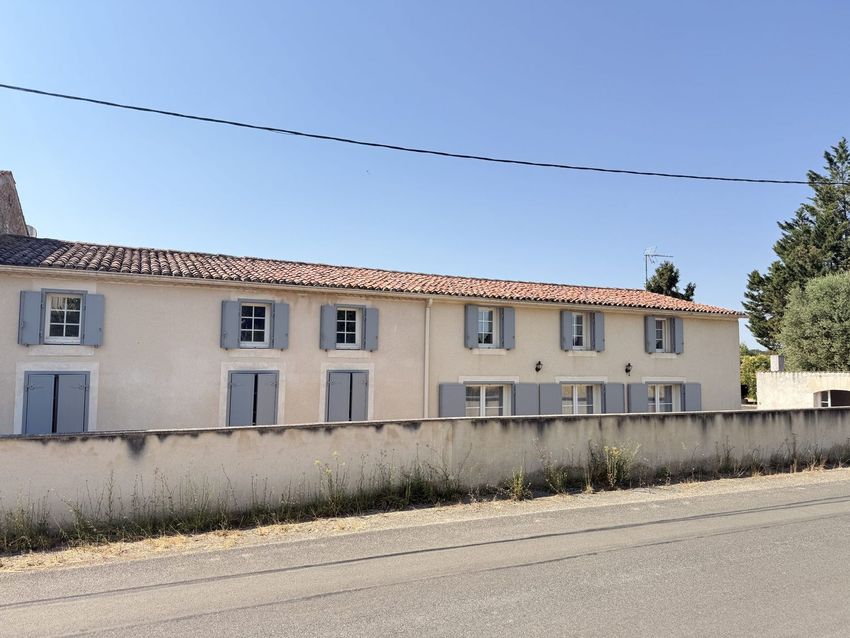 Image Façade à  maison individuelle de Cravans