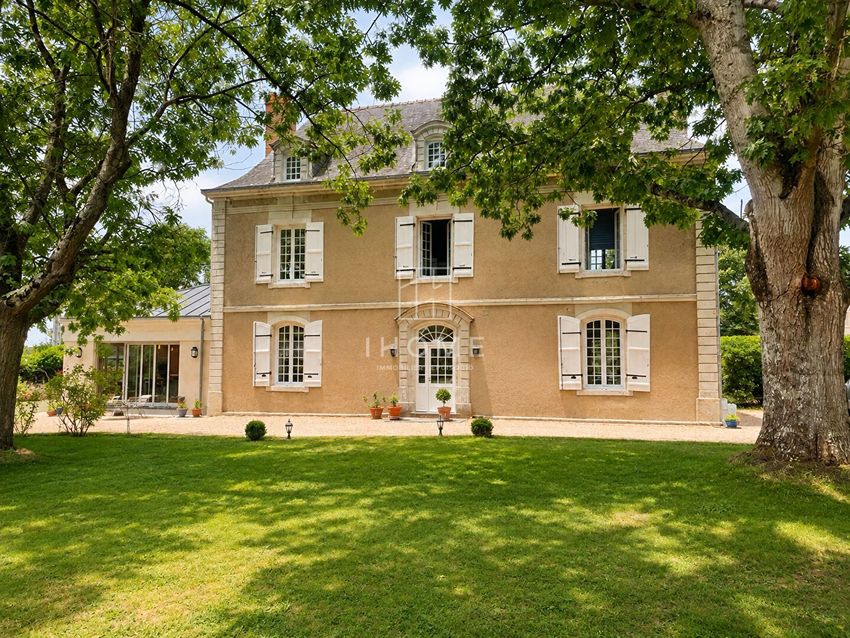 Image Façade à  maison individuelle de Feneu