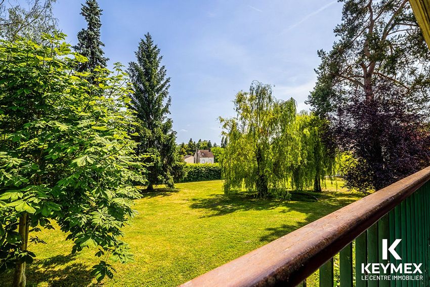 Image Jardin à  maison individuelle de Parmain