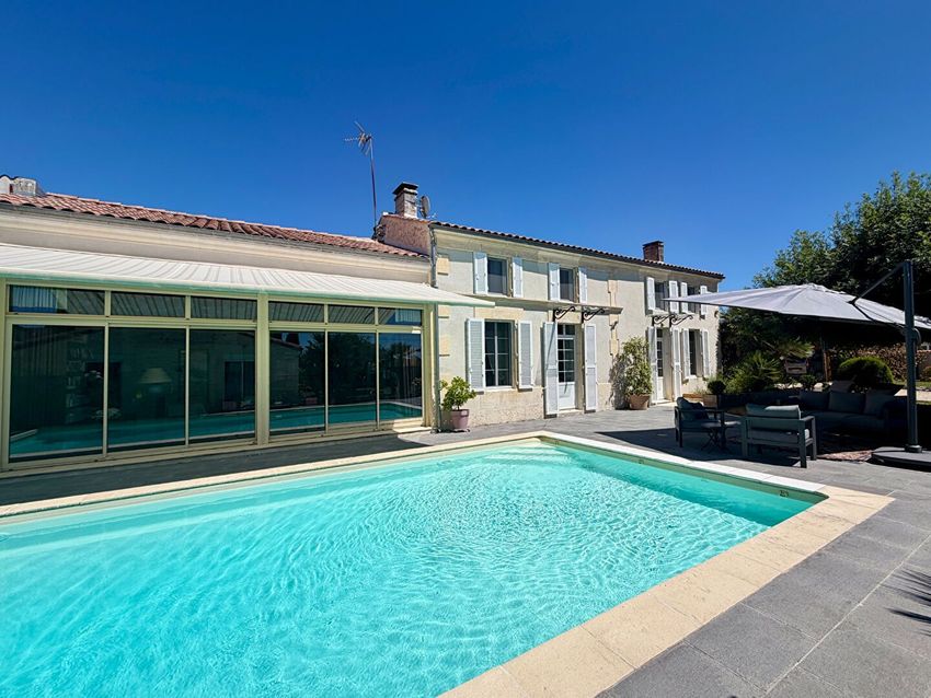Image Piscine à  maison mitoyenne de Migron