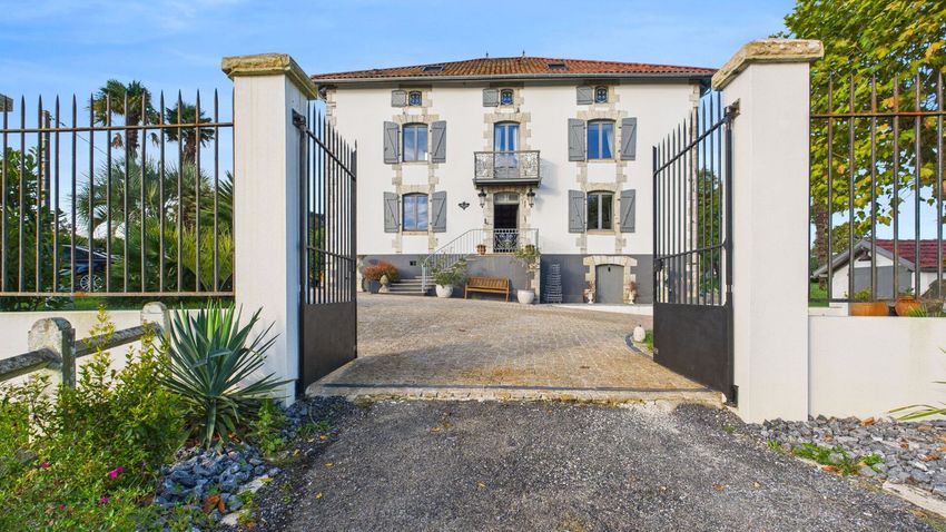 Image Façade à  maison individuelle de Guiche