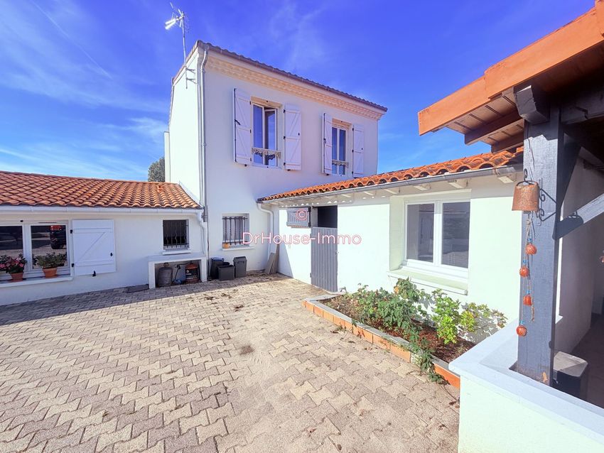 Image Façade à  maison jumelée de Saint-Laurent-Médoc