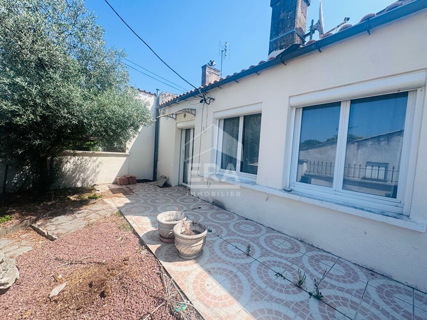 Image Façade à  maison mitoyenne de Comps