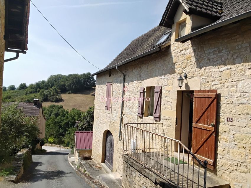 Image Façade à  maison jumelée de Naussac