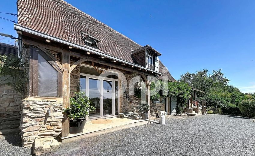 Image Façade à  maison individuelle de Génis