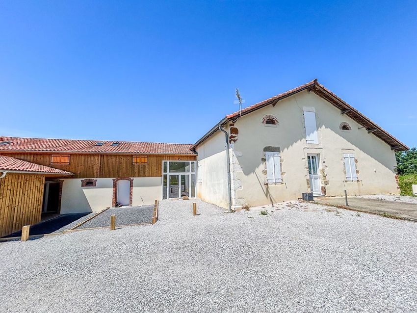 Image Façade à  maison individuelle de Buanes
