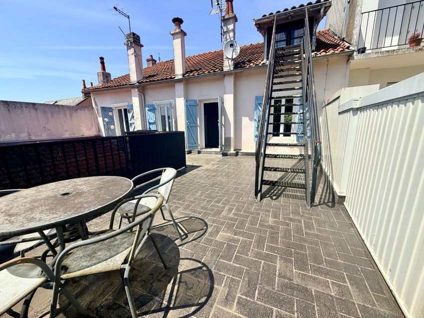Image Terrasse à  maison mitoyenne de Séméac