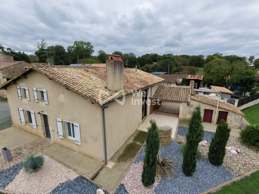 Image Façade à  maison individuelle de Aigondigné