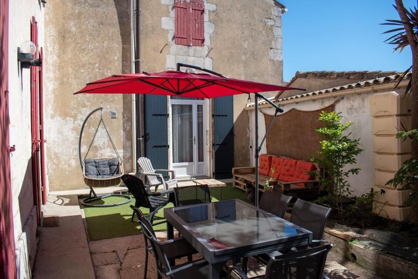 Image Terrasse à  maison mitoyenne de Nancras