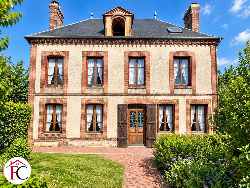 Image Façade à  maison de village de Crulai