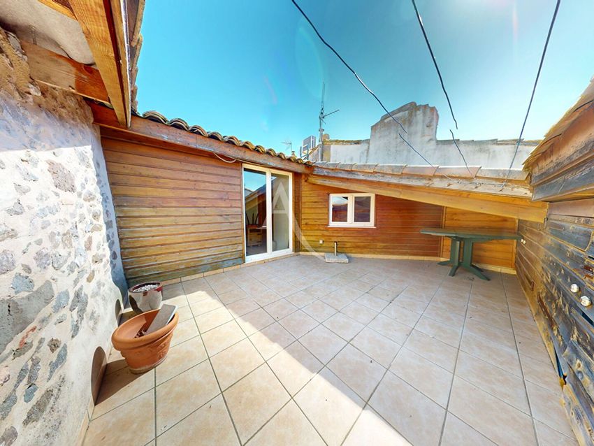 Image Terrasse à  maison mitoyenne de Escales