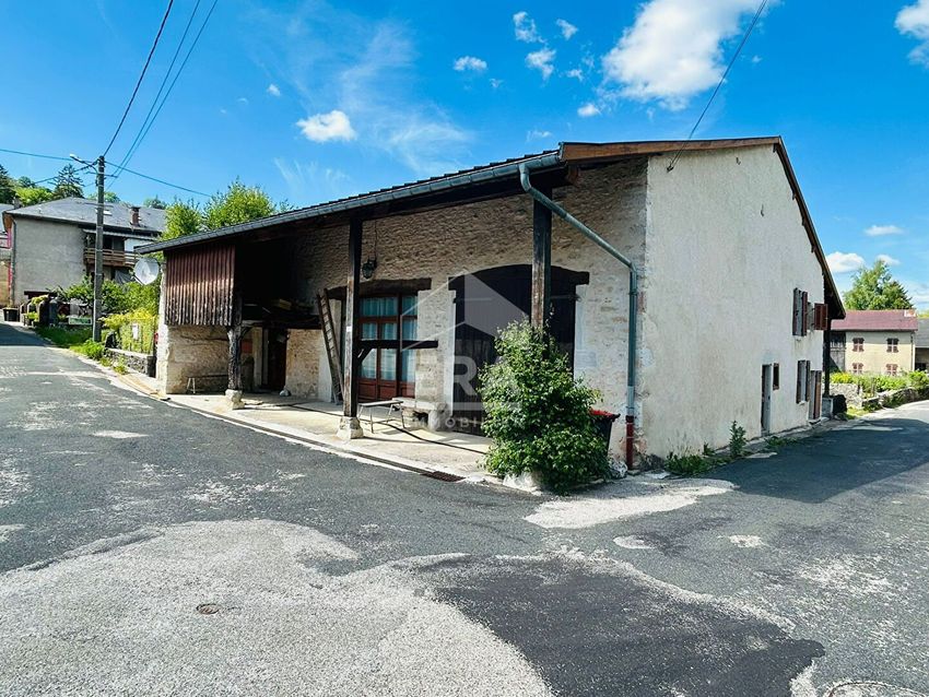 Image Façade à  maison individuelle de Champdor-Corcelles
