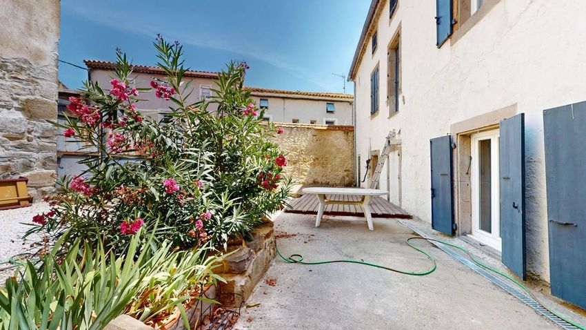 Image Façade à  maison mitoyenne de Villedaigne