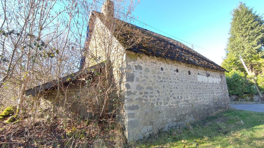 Image Façade à  maison individuelle de Sarroux - Saint Julien