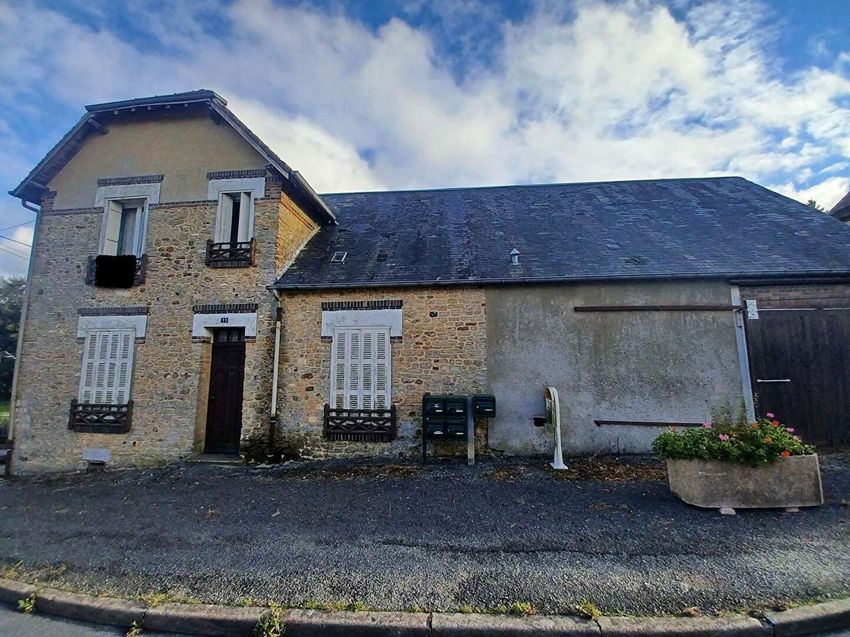 Image Façade à  maison de village de Planches