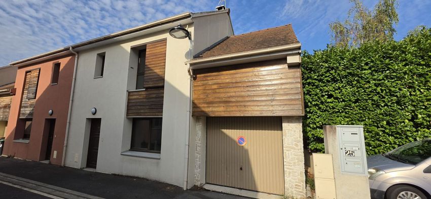 Image Façade à  maison individuelle de Taverny