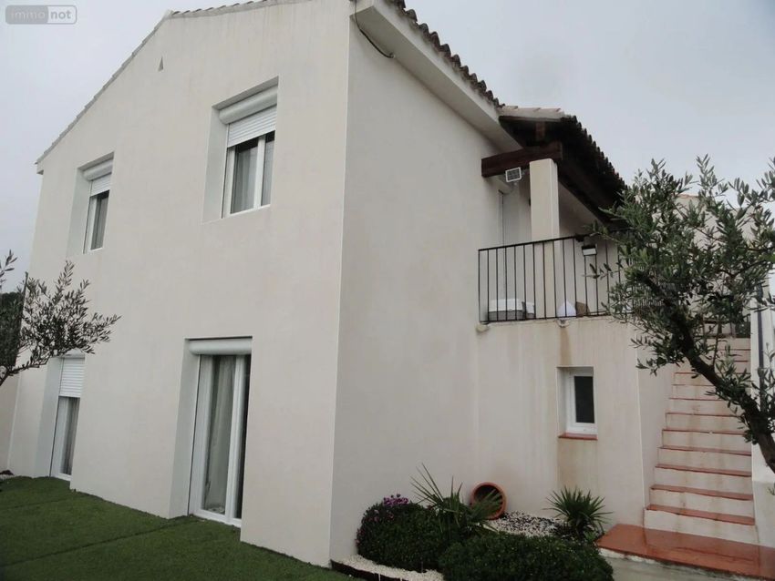 Image Façade à  maison individuelle de Garons