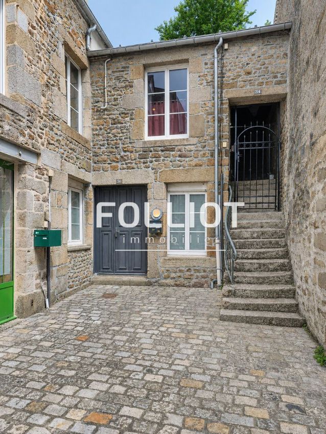 Image Vue à  maison mitoyenne de Villedieu-les-Poêles-Rouffigny