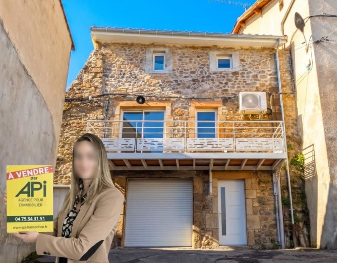 Image Façade à  maison de village de Serrières