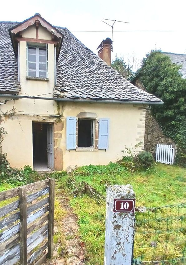Image Façade à  maison mitoyenne de Saint-Santin-Cantalès